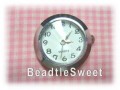 Silver Watch Face with multi-faceted surface